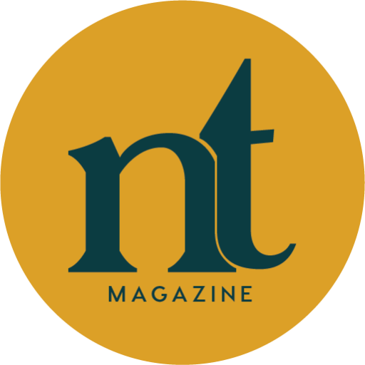 New Territory logomark: gold circle with dark blue "NT magazine"