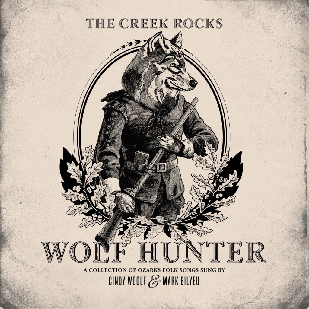 album cover of a wolf, feels old-timey, title is Wolf Hunter, band listed at top is The Creek Rocks